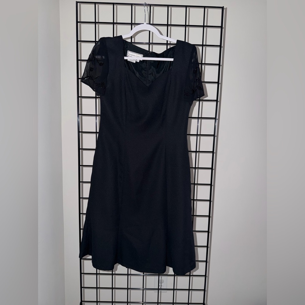 Chic Black Mini Dress with Sheer Sleeves